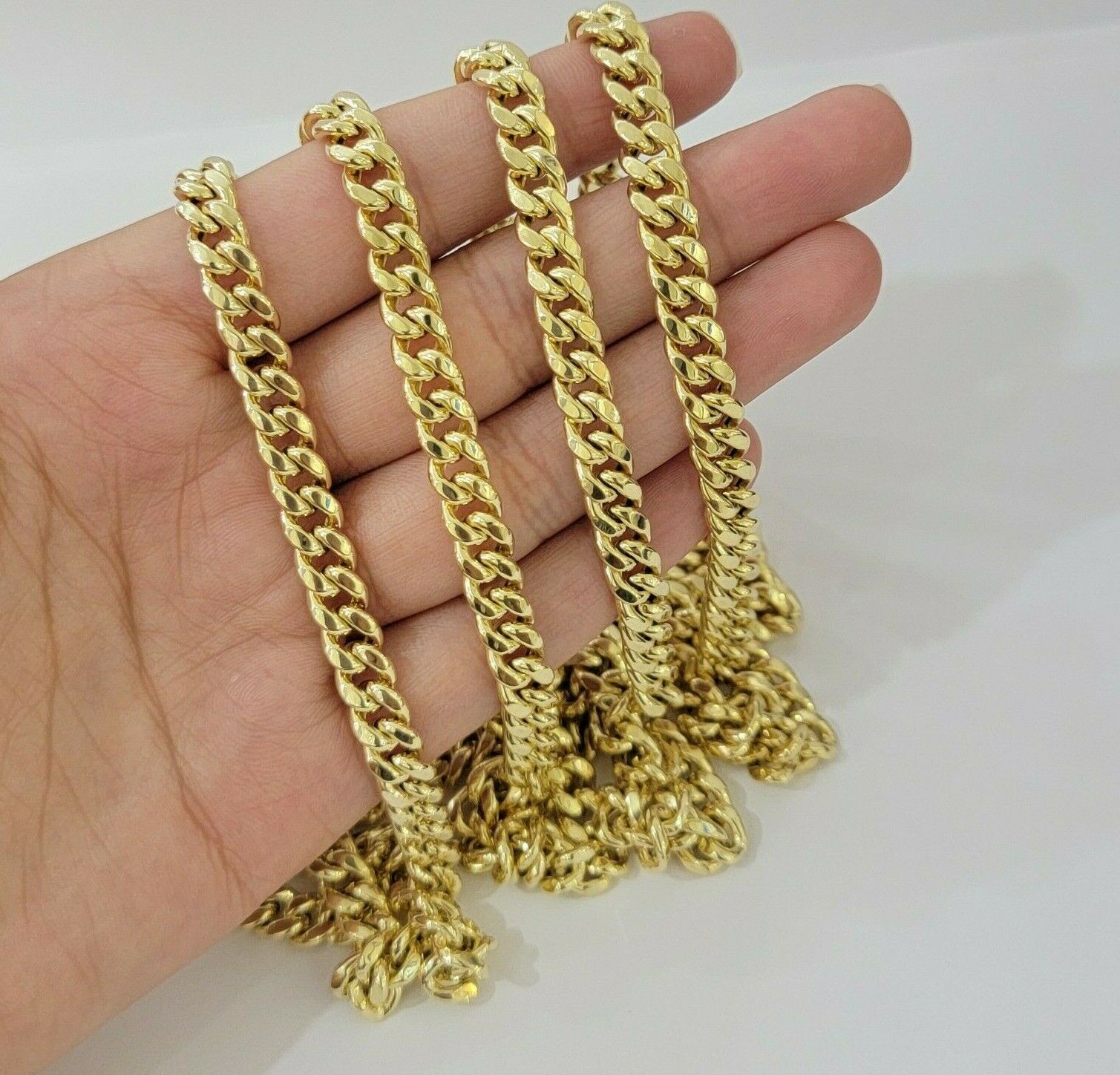 Real 10k Gold Miami Cuban chain 7mm 24" Lobster Lock Men's 10kt Yellow Gold, MEN - GoldenlinQ